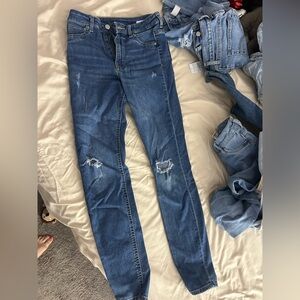 Distressed Blue Denim Jeans